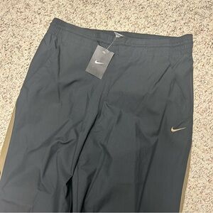 Nike Track Pants Black Gold Stripe Wide-Leg Ankle Zip Medium Mesh Lined 33x32